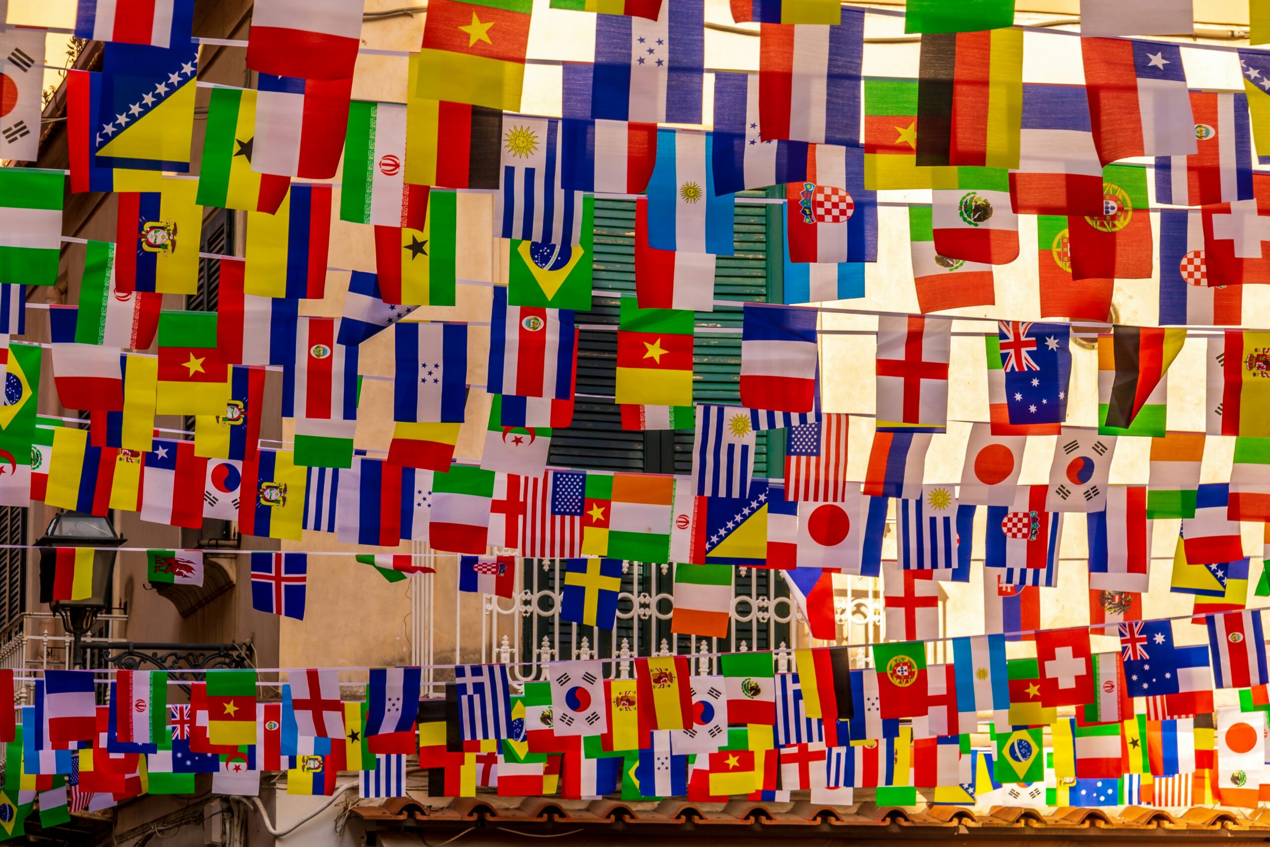 Flags representing different countries across the globe